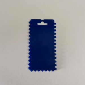 Espatula Dentada Plástico Natirel  15 x 8 cms.